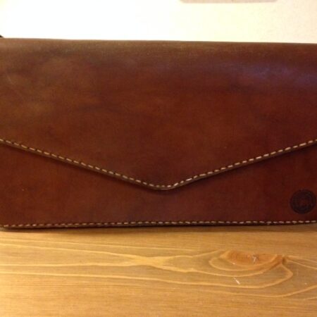 Stoere bruin lederen clutch