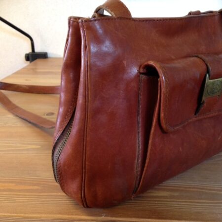 Mooie bruin lederen vintage tas van Burkely's Leather House
