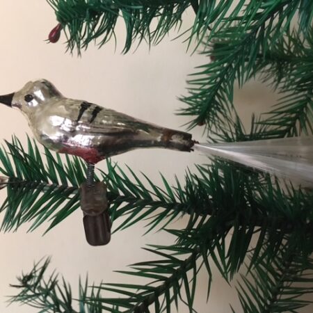 Oude kerstvogel van dun geblazen glas in zilver en zwart eerste helft 1900