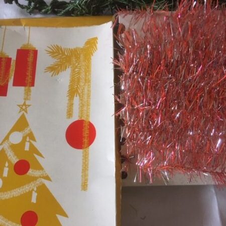 Retro oude verpakking met zilver/roze Kerstslinger jaren 1950