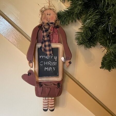 Van Apple tree een lieflijke houten dame met Kerstwens