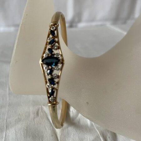 14kt. geelgouden slaven armband met natuurlijke saffier en diamant