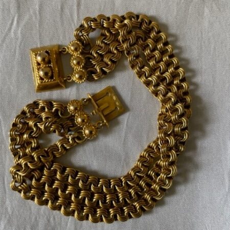 14 kt. geelgouden armband met 3 rijen van 3 dubbele schakels in etui