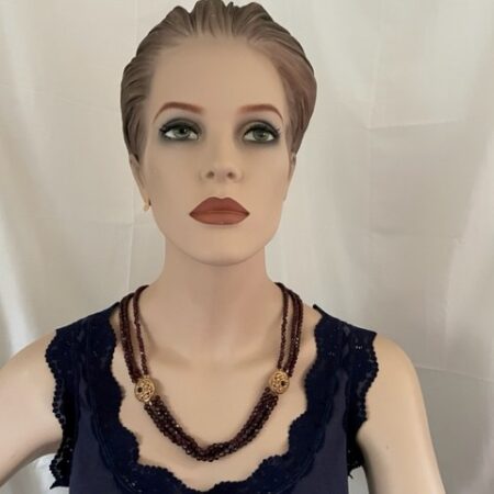 Set van collier en armband van rode granaten aan 14 kt. geelgouden sloten