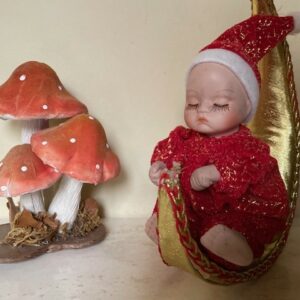 Kerst muziekdoos of speeldoos een bewegende droombaby in de maan