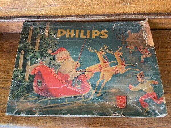 Antieke doos met Philips kerstverlichting op ronde metalen veren 1930-1940