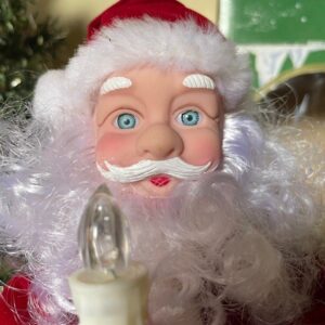 Oude bewegende kerstman een muziekdoos met "Jingle Bell's" in doos 1980-1990