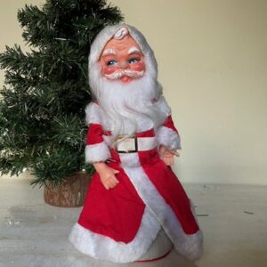 Antieke mechanische bewegende Kerstman een muziekdoos met "Jingle Bell's" 1950-1960